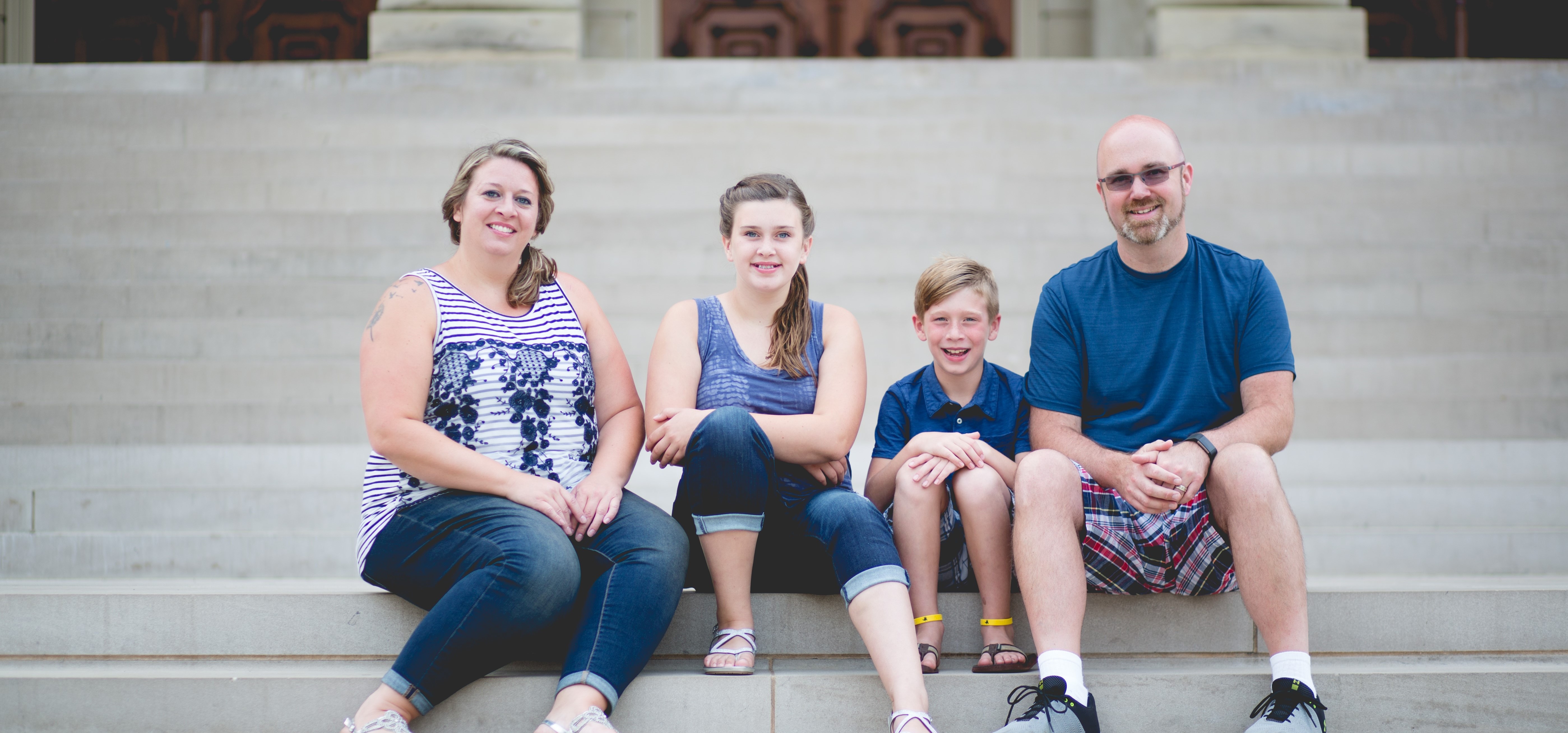 Family portrait - mom, dad, daughter and son