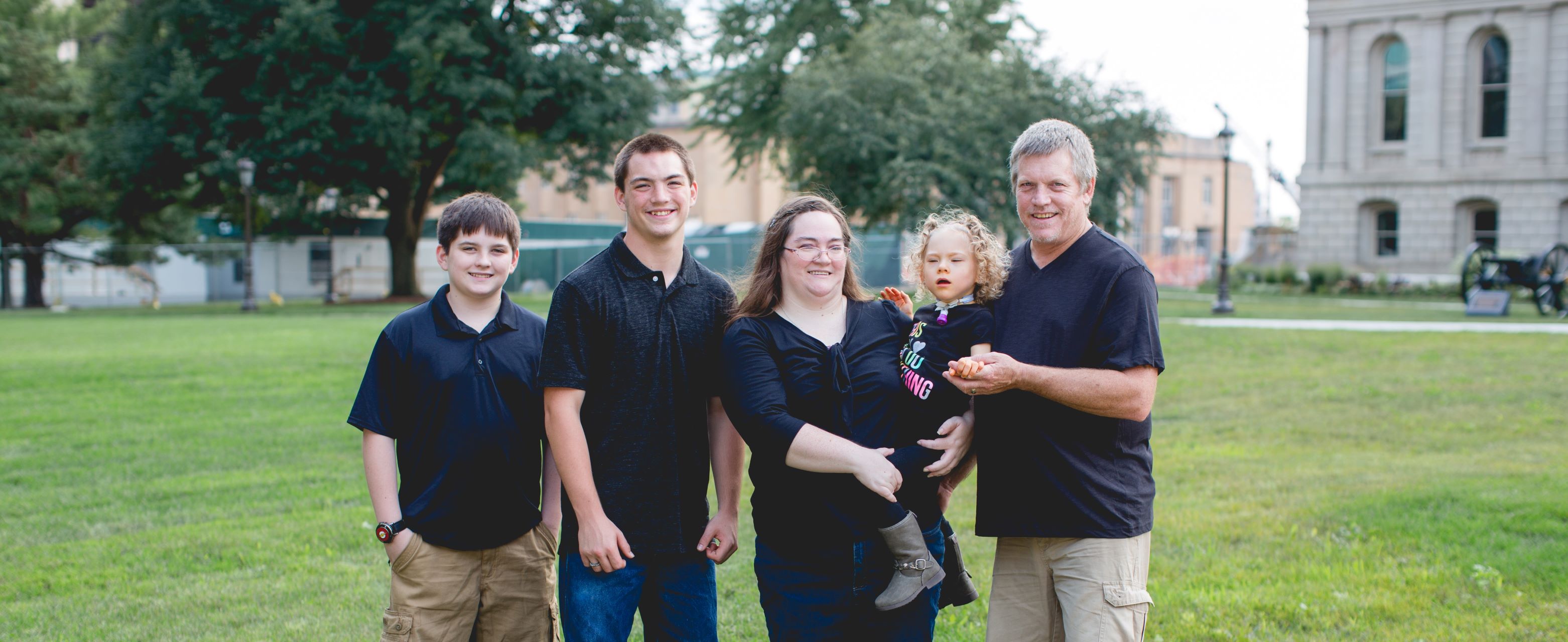 Family portrait - mom, dad, two brothers and sister 