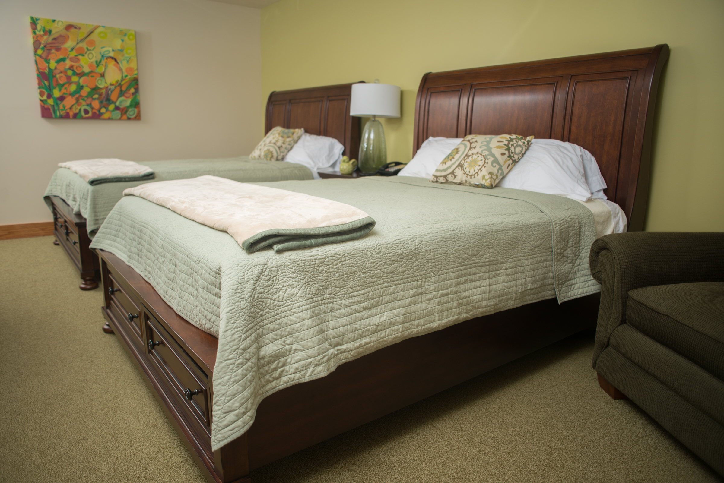 Two queen beds prepared for future guests